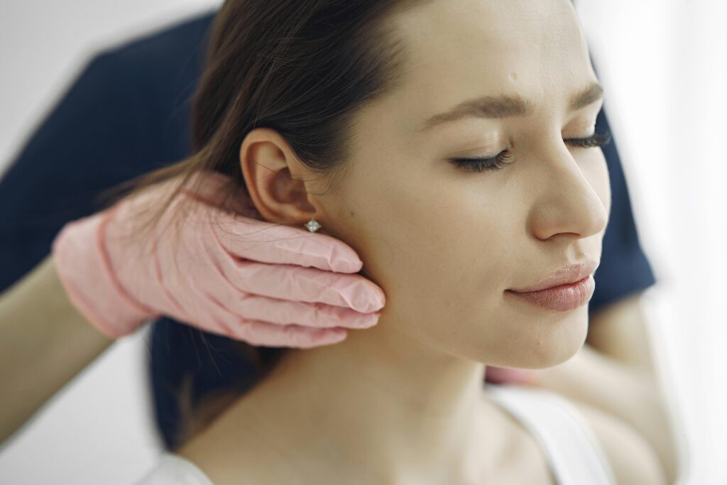 Professional facial massage promotes relaxation and healthy skin at a spa clinic.
